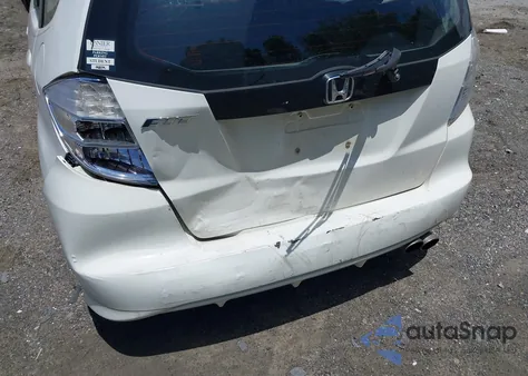 2009 Honda Fit Sport from USA, damaged, VIN JHMGE874X9S056745